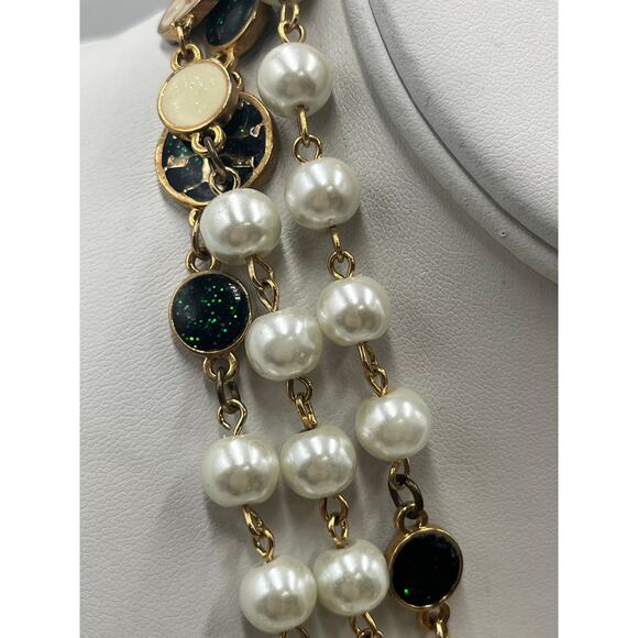 Tory Burch Authentic Long
Pearl Logo Medallion
Multi-Strand Gold 60" Necklace - Picture 13 of 15